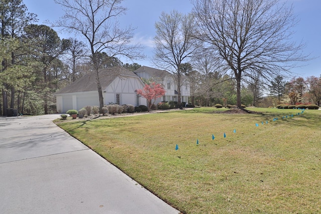 view of yard with a garage