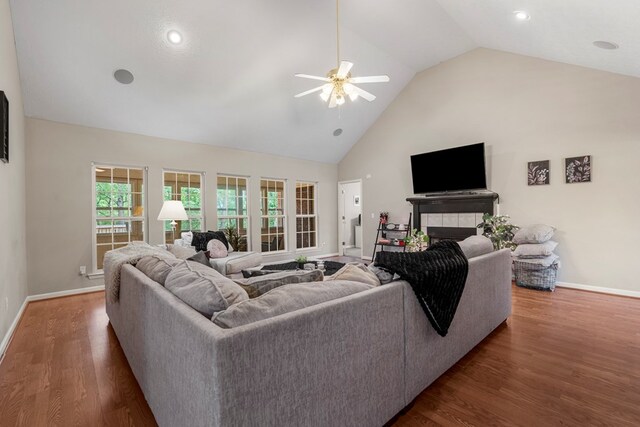 485 Boyd Branch Dr, Upatoi, GA 31829 - living area featuring a ceiling fan, high vaulted ceiling, baseboards, and wood finished floors