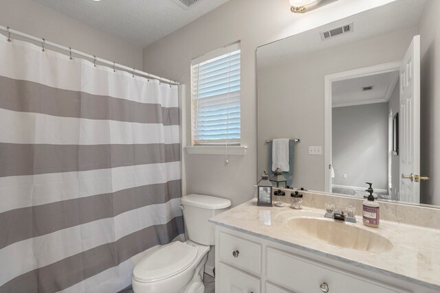 485 Boyd Branch Dr, Upatoi, GA 31829 - bathroom with toilet, vanity, a textured ceiling, and a shower with shower curtain