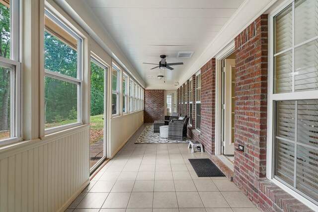 485 Boyd Branch Dr, Upatoi, GA 31829 - unfurnished sunroom with ceiling fan