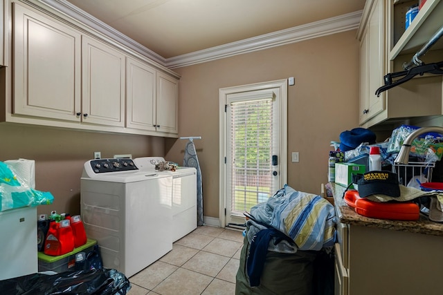 8026 Splendor Way, Columbus, GA 31904 - laundry area with separate washer and dryer, cabinet space, ornamental molding, and light tile patterned floors