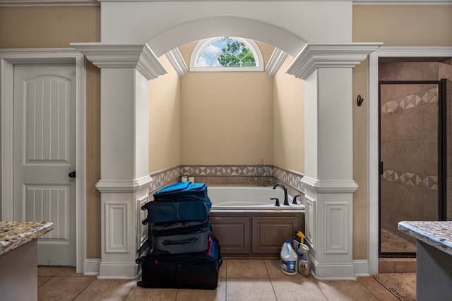 8026 Splendor Way, Columbus, GA 31904 - full bathroom with a garden tub, tile patterned floors, a stall shower, and ornate columns