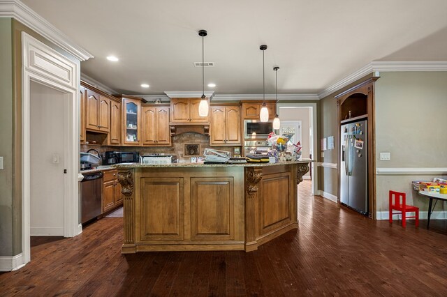8026 Splendor Way, Columbus, GA 31904 - kitchen with appliances with stainless steel finishes, under cabinet range hood, decorative backsplash, crown molding, and a center island