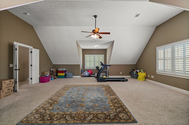 8026 Splendor Way, Columbus, GA 31904 - recreation room with vaulted ceiling, carpet, ceiling fan, and a textured ceiling