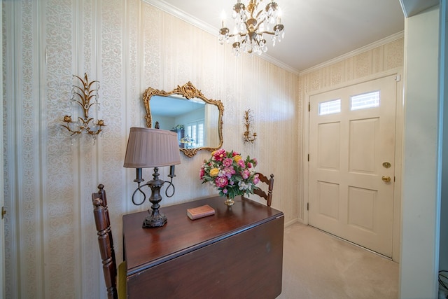 carpeted entryway with crown molding and an inviting chandelier