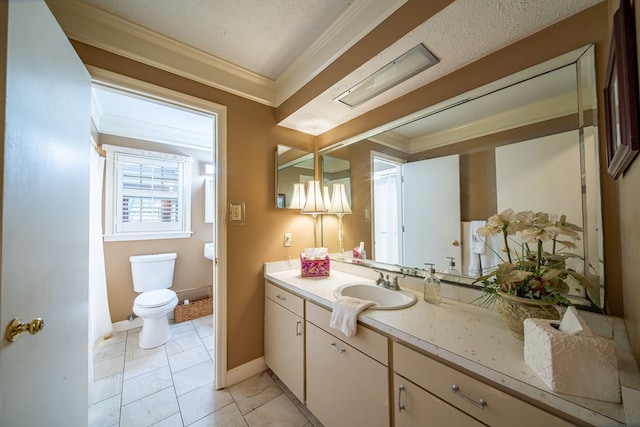 bathroom with vanity, crown molding, and toilet