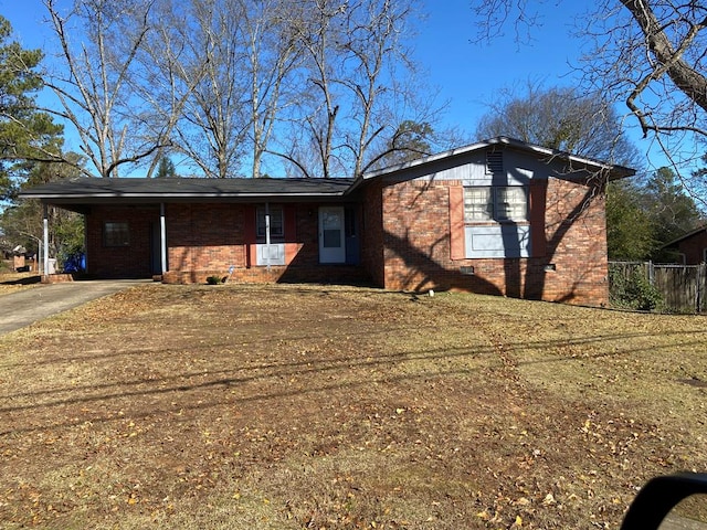 view of front of property with a carport