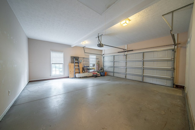 4548 Carnoustie Ln, Columbus, GA 31909 - garage with a garage door opener and baseboards