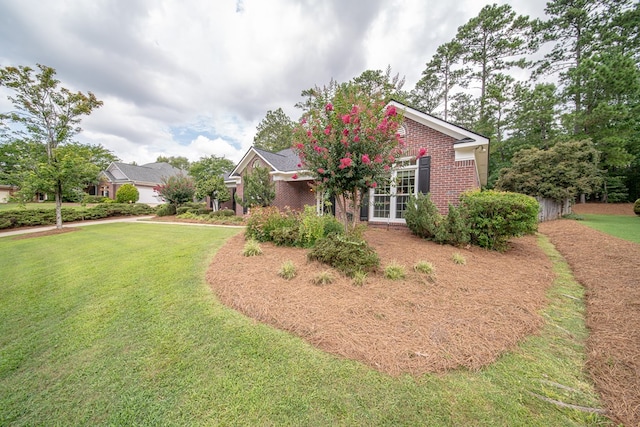 4548 Carnoustie Ln, Columbus, GA 31909 - view of front of property with brick siding and a front lawn