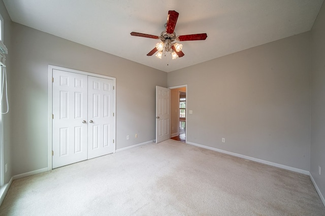 4548 Carnoustie Ln, Columbus, GA 31909 - unfurnished bedroom featuring light colored carpet, a closet, and a ceiling fan