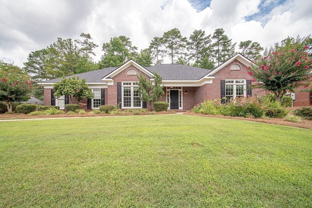 4548 Carnoustie Ln, Columbus, GA 31909 - ranch-style home featuring a front lawn and brick siding