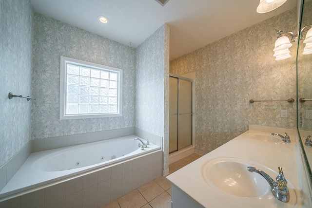 4548 Carnoustie Ln, Columbus, GA 31909 - bathroom featuring a whirlpool tub, tile patterned floors, a stall shower, and double vanity