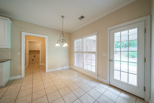 4548 Carnoustie Ln, Columbus, GA 31909 - unfurnished dining area featuring ornamental molding, light tile patterned floors, healthy amount of natural light, and a chandelier