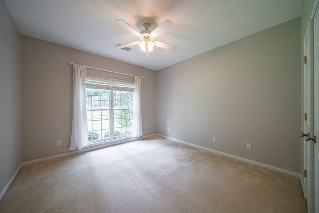 4548 Carnoustie Ln, Columbus, GA 31909 - spare room featuring light carpet and a ceiling fan