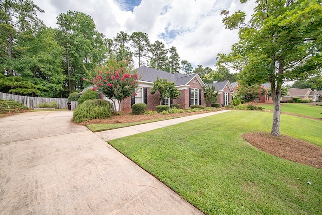 4548 Carnoustie Ln, Columbus, GA 31909 - view of front of house featuring concrete driveway and brick siding