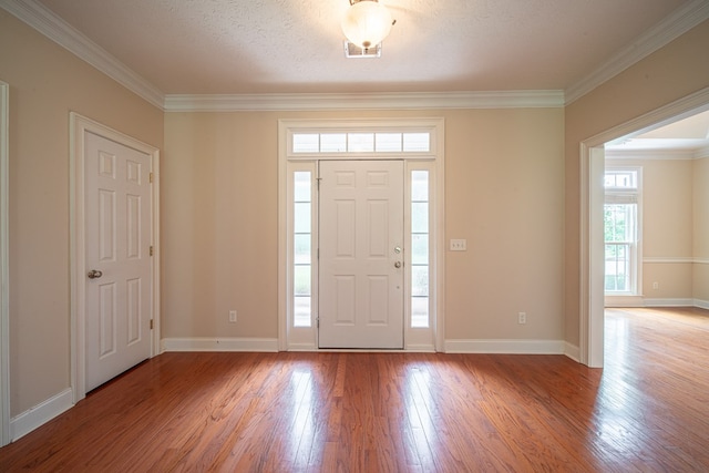4548 Carnoustie Ln, Columbus, GA 31909 - foyer entrance with wood finished floors and ornamental molding