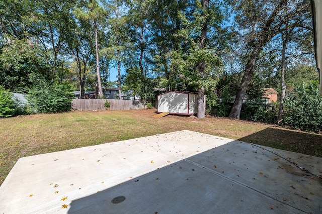 3409 Primrose Rd, Columbus, GA 31907 - view of yard with a storage shed and a patio area