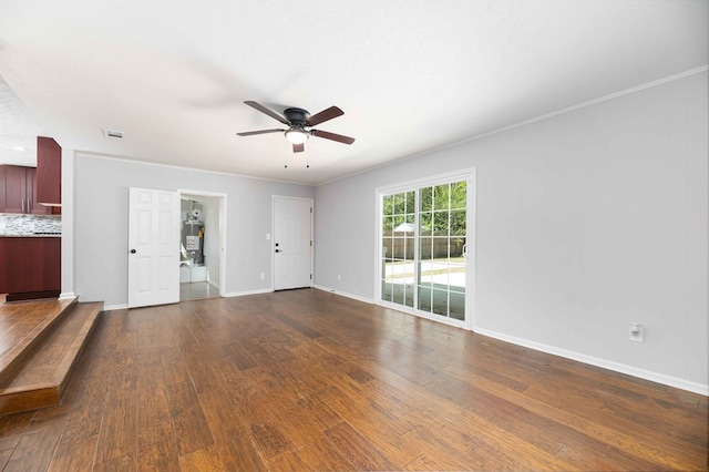 3409 Primrose Rd, Columbus, GA 31907 - unfurnished living room with ceiling fan, dark wood-type flooring, and water heater