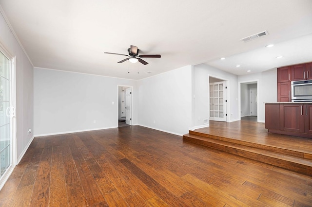 3409 Primrose Rd, Columbus, GA 31907 - unfurnished living room featuring ceiling fan, dark wood-type flooring, and recessed lighting