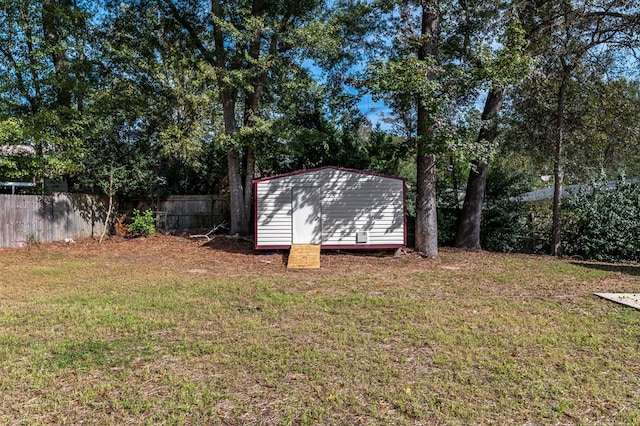 3409 Primrose Rd, Columbus, GA 31907 - view of yard featuring a storage unit