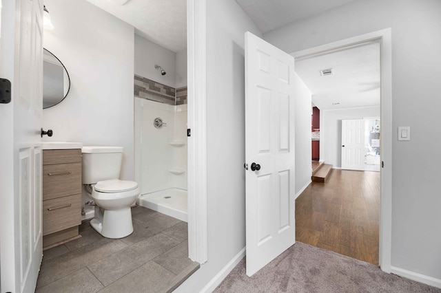3409 Primrose Rd, Columbus, GA 31907 - bathroom featuring a stall shower and toilet
