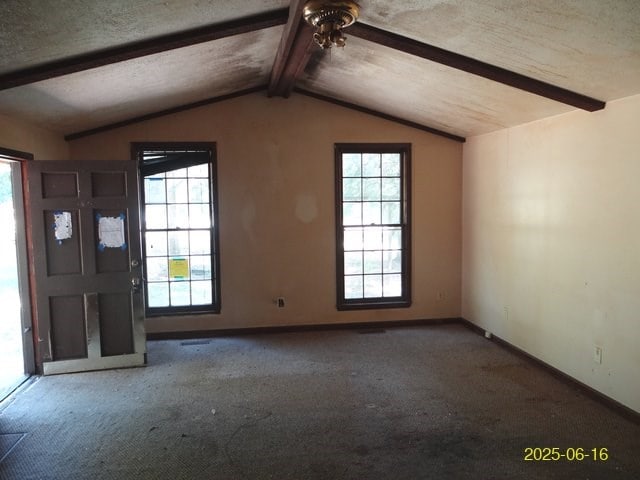 66 Glennhaven Rd, Phenix City, AL 36869 - unfurnished living room with carpet floors and a ceiling fan