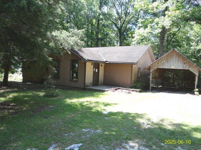 66 Glennhaven Rd, Phenix City, AL 36869 - view of front of home featuring a front yard and a carport