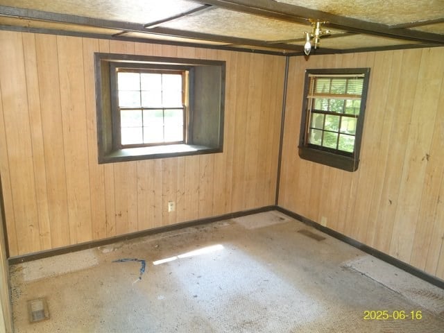 66 Glennhaven Rd, Phenix City, AL 36869 - empty room with wood walls and baseboards