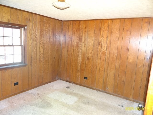 66 Glennhaven Rd, Phenix City, AL 36869 - spare room featuring carpet floors and wooden walls