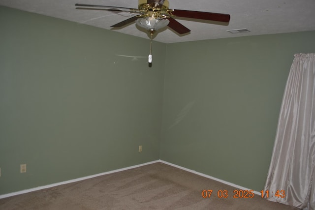 13642 Macon Rd, Upatoi, GA 31829 - empty room with a ceiling fan and carpet flooring