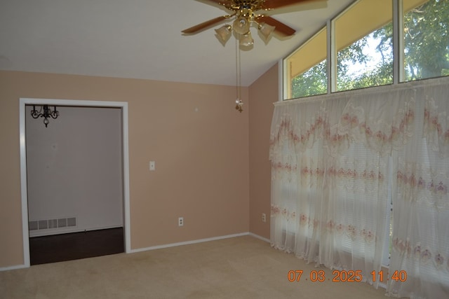 13642 Macon Rd, Upatoi, GA 31829 - spare room featuring carpet floors, a ceiling fan, and lofted ceiling