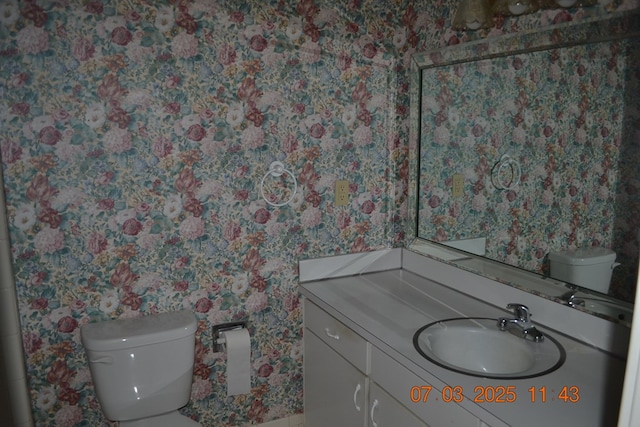 13642 Macon Rd, Upatoi, GA 31829 - bathroom featuring wallpapered walls and vanity