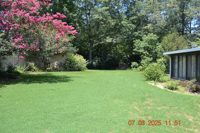 13642 Macon Rd, Upatoi, GA 31829 - view of grassy yard with a sunroom