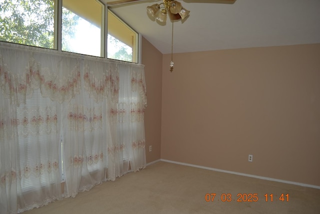 13642 Macon Rd, Upatoi, GA 31829 - unfurnished room with carpet flooring, ceiling fan, and vaulted ceiling