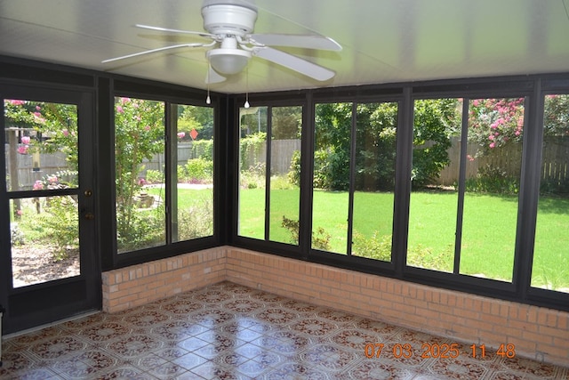 13642 Macon Rd, Upatoi, GA 31829 - unfurnished sunroom with a ceiling fan and brick wall