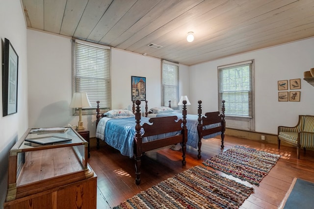 171 Jefferson Ave, Talbotton, GA 31827 - bedroom featuring visible vents, wood ceiling, and hardwood / wood-style flooring