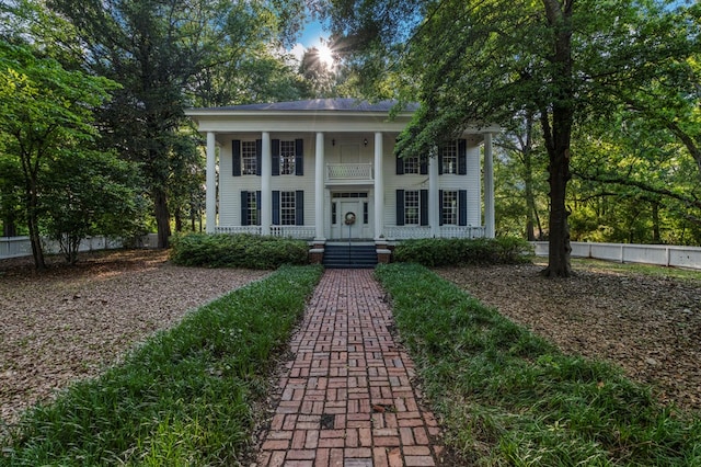 171 Jefferson Ave, Talbotton, GA 31827 - greek revival inspired property featuring fence and covered porch
