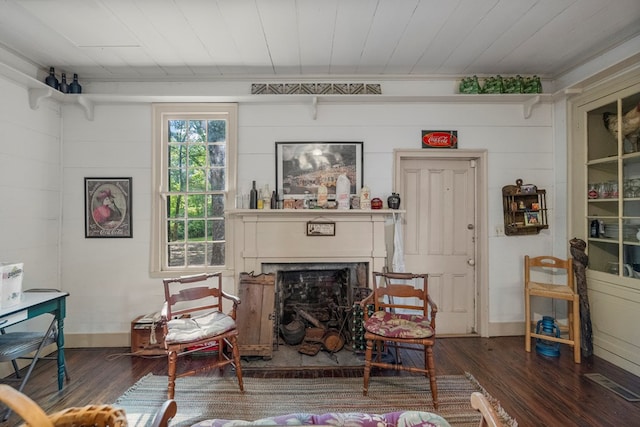 171 Jefferson Ave, Talbotton, GA 31827 - living area with baseboards, wood finished floors, and a fireplace
