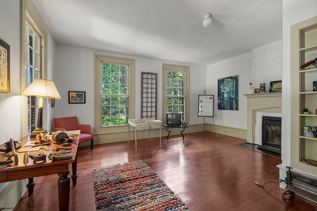 171 Jefferson Ave, Talbotton, GA 31827 - interior space with a fireplace with flush hearth and wood finished floors