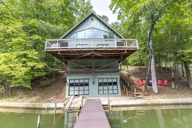 340 Commadore Dr, Hamilton, GA 31811 - rear view of property with a deck with water view and stairway