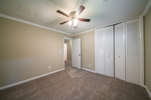3 Primrose Ct, Columbus, GA 31907 - unfurnished bedroom featuring carpet flooring, crown molding, ceiling fan, and a closet