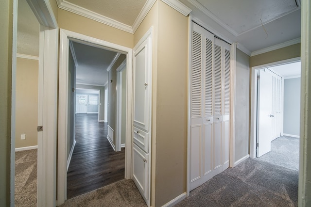 3 Primrose Ct, Columbus, GA 31907 - hallway featuring attic access, dark colored carpet, and ornamental molding