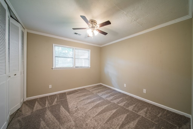 3 Primrose Ct, Columbus, GA 31907 - unfurnished bedroom with carpet, ornamental molding, a ceiling fan, and a textured ceiling