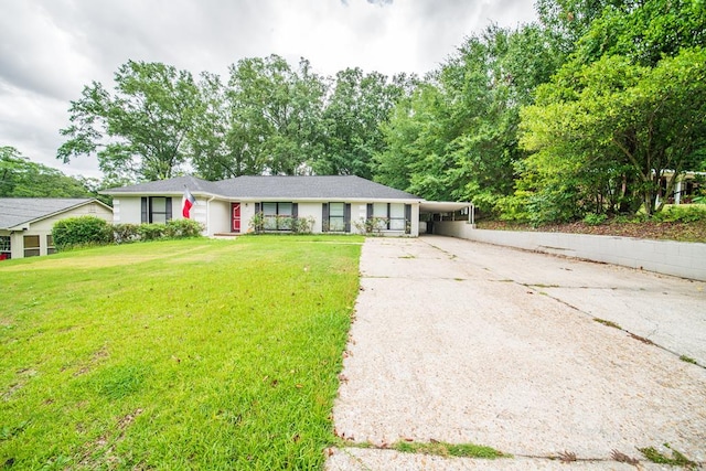 3 Primrose Ct, Columbus, GA 31907 - single story home with driveway, a carport, and a front yard