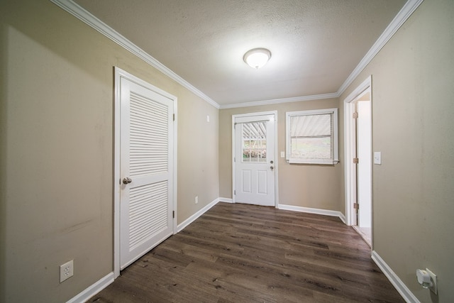 3 Primrose Ct, Columbus, GA 31907 - foyer featuring ornamental molding, dark wood-style floors, and a textured ceiling