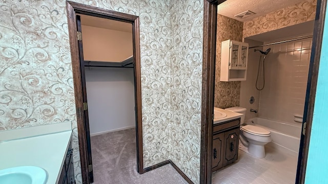 full bathroom featuring vanity, toilet, and washtub / shower combination