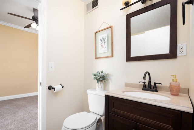 bathroom featuring vanity, ceiling fan, toilet, and crown molding