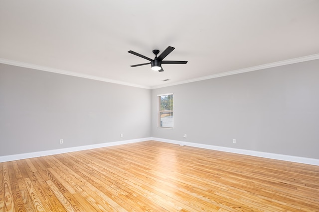 spare room featuring ceiling fan, light hardwood / wood-style flooring, and ornamental molding