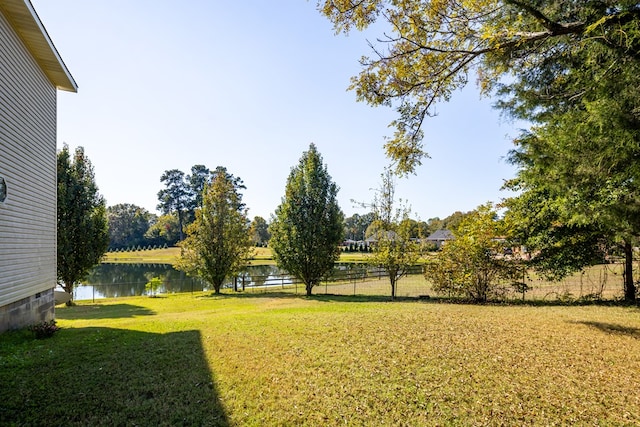 view of yard with a water view