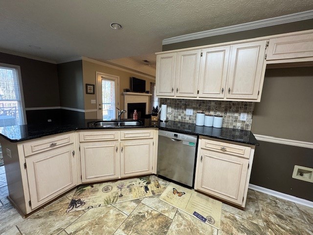 kitchen with stainless steel dishwasher, sink, crown molding, and kitchen peninsula